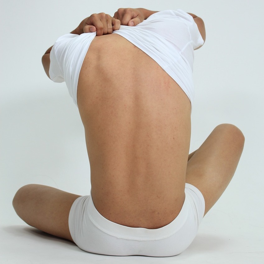 Man in underwear from behind
